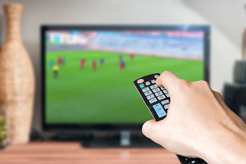 Remote Pointed at Football on TV